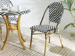 Beliani 4-istuttava Ulkoruokailuryhmä Polyrottinki Musta/valkoinen RIFREDDO 16 Beliani 4-istuttava Ulkoruokailuryhmä Polyrottinki Musta/valkoinen RIFREDDO -Ulkokalusteet myymälä undef src sa picid 798809 type whitesh image